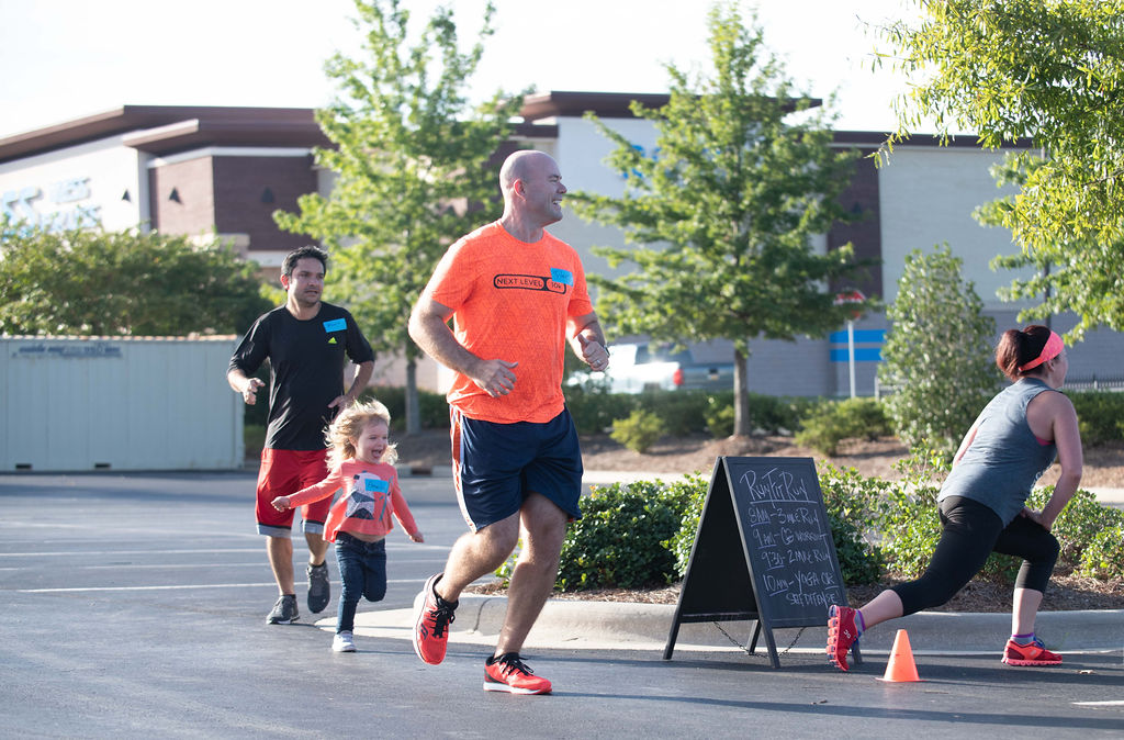 man and child running