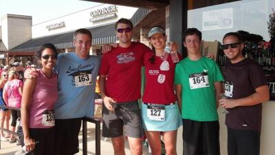 Kate and Justin, center, at last year's Downhill Mile