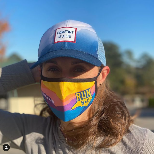 woman in facemask with "run nc"