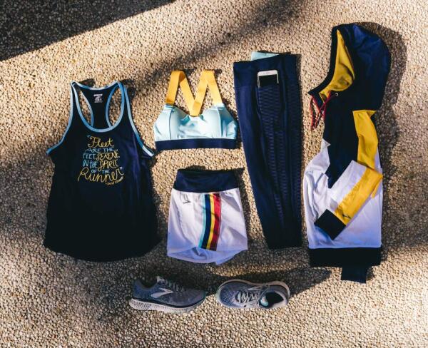 Brooks tank, shirt, sports bra, shoes, jacket on gray background