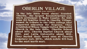 city marker noting the Oberlin Village historic area