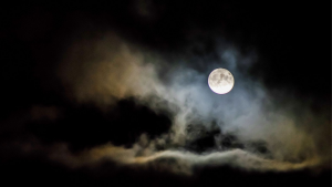 full moon at night with some clouds