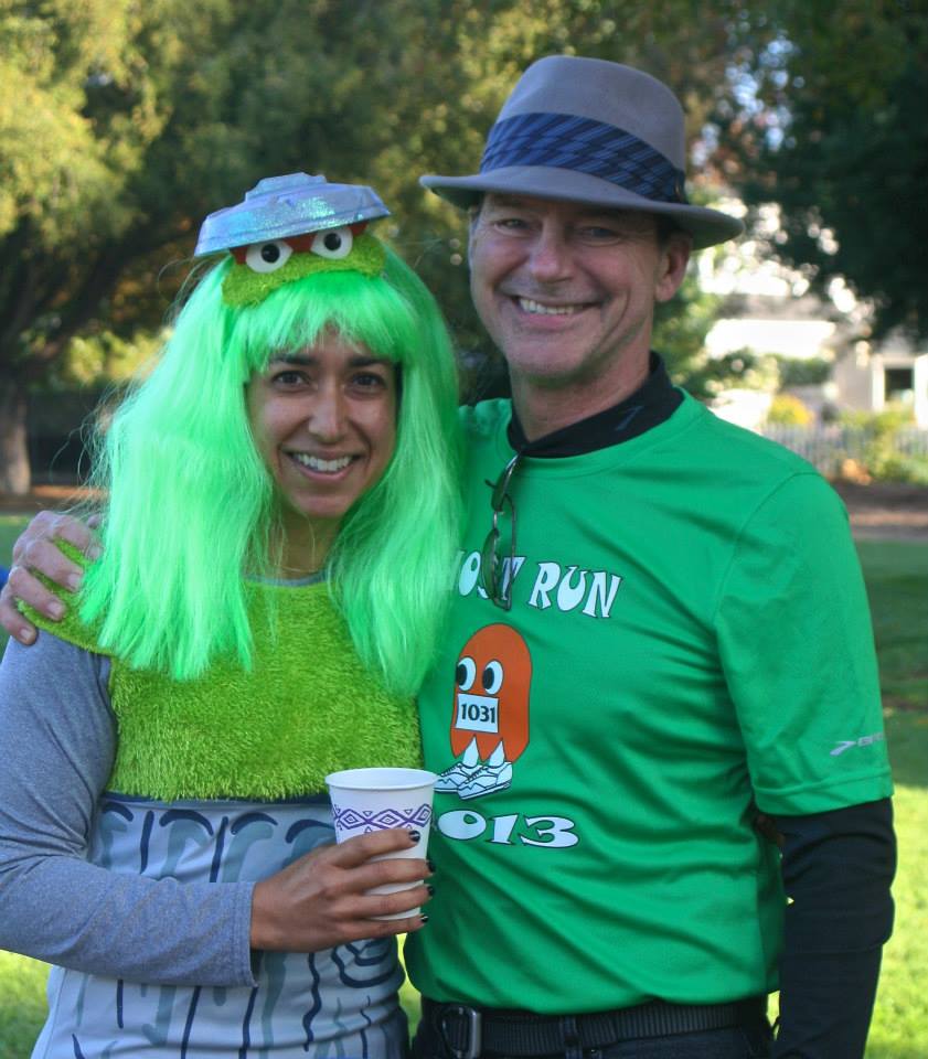 Runners dressed in green