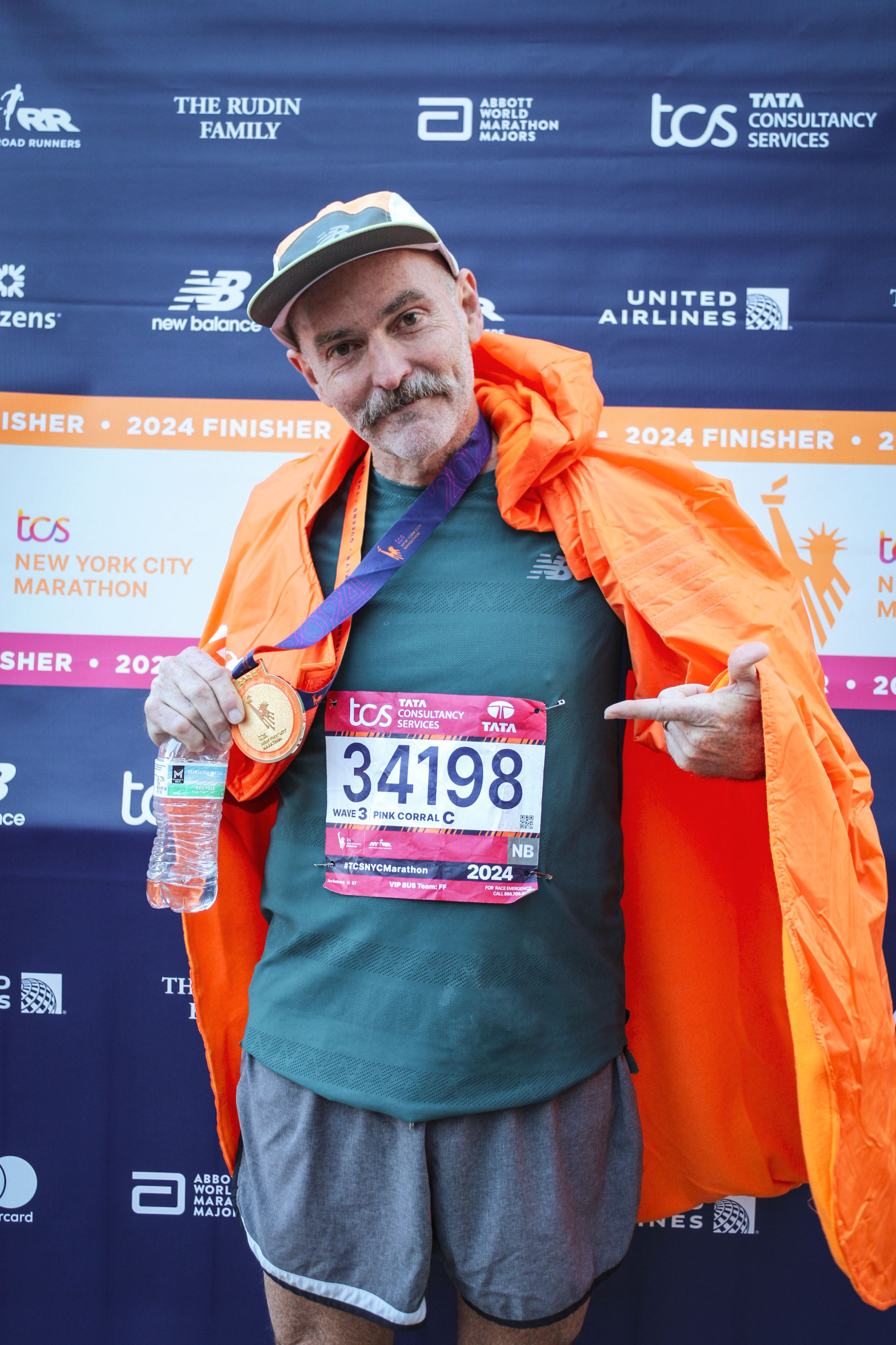 Jim with finisher medal NY Marathon 2024