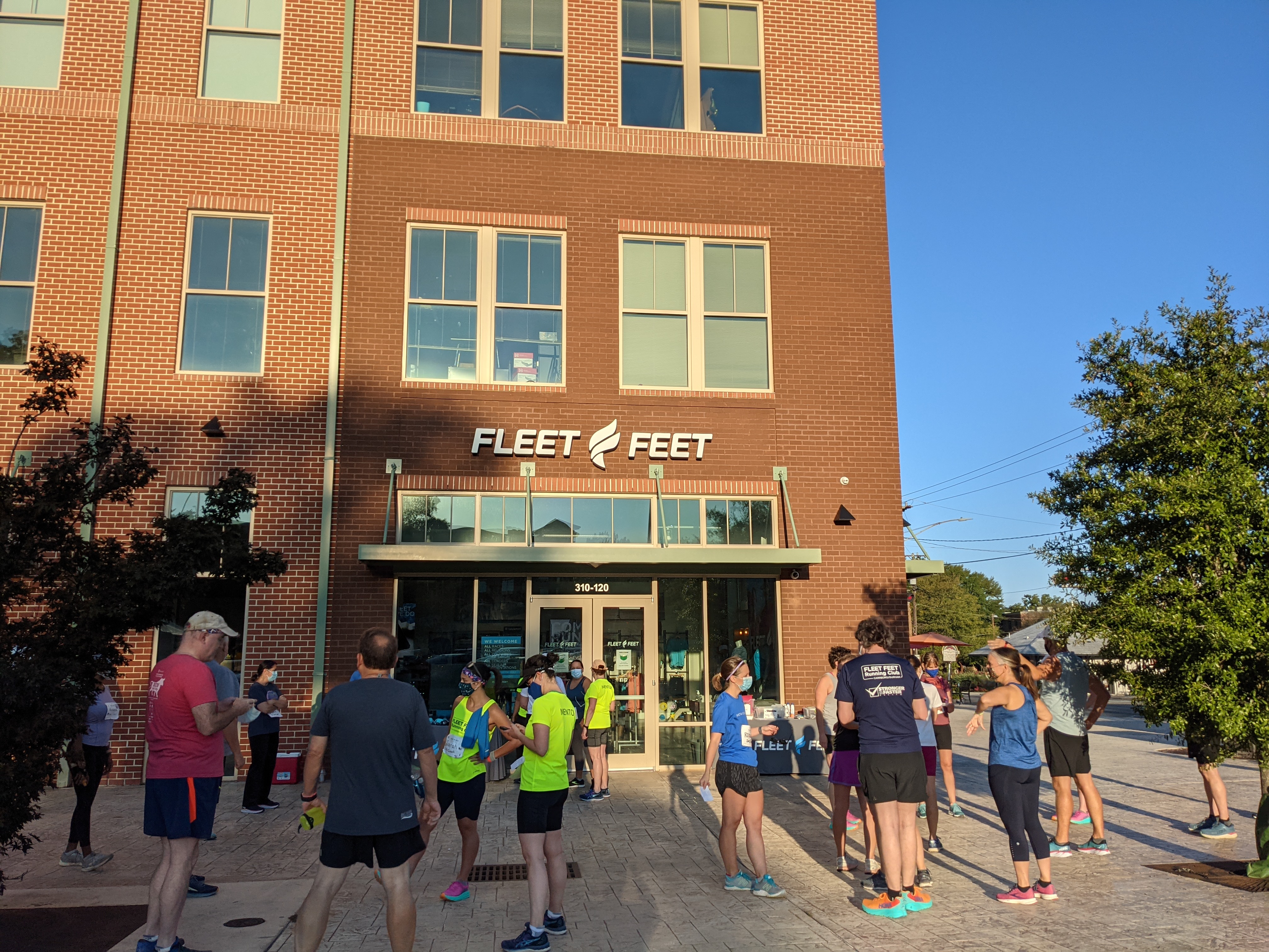 group of runners/walkers outside Fleet Feet in Carrboro, NC