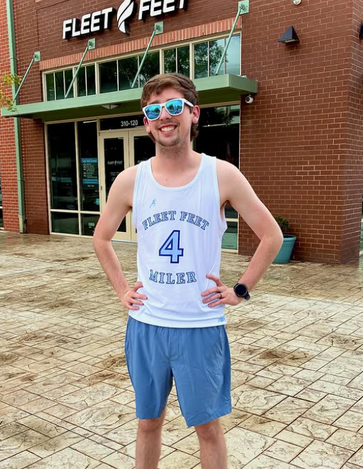 runner wearing a 4 miler shirt