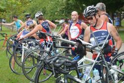 Tri group racking their bikes before the race