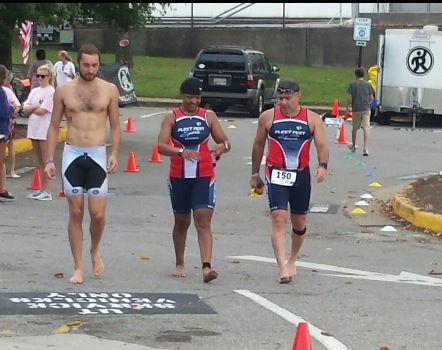 Colin, Shameka, and Shahin heading to the swim start