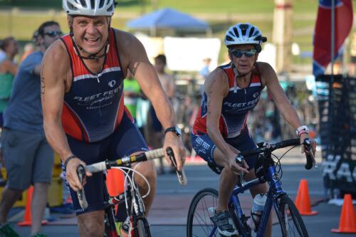 Bill and MaryJane biking in a triathlon