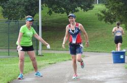 Anne splashing Katlyn at the water stop!