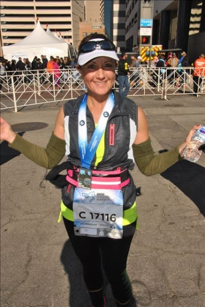Angie Mills at the finish line of a race