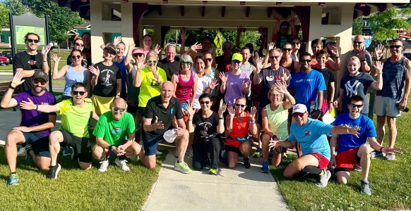A group of runners taking a photo together
