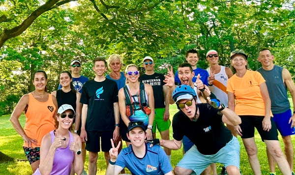 group of runners taking a photo together