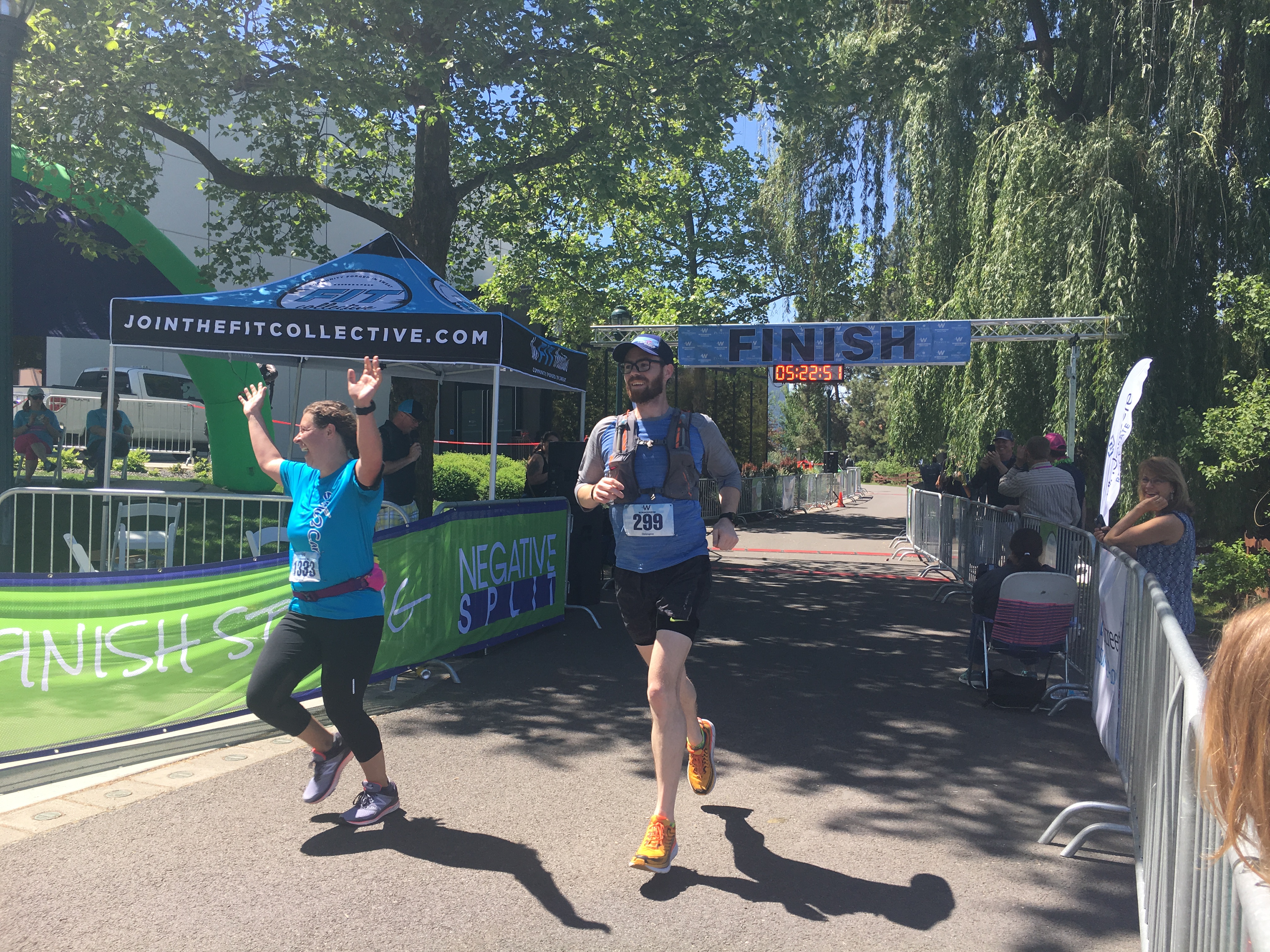 Chris crossing the finish line of a race