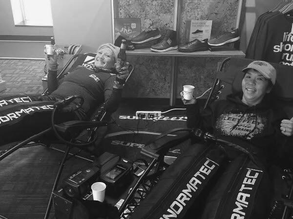 Normatec recover with a friend