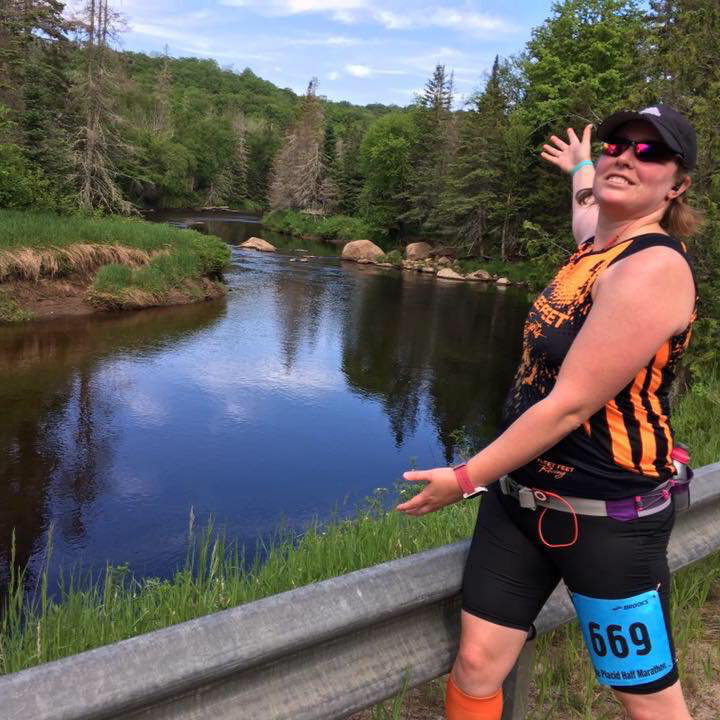 Gretchen on bridge during Lake Placid Half Marathon