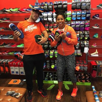 Trainers Parker and Amanda having some fun while shopping at Fleet Feet