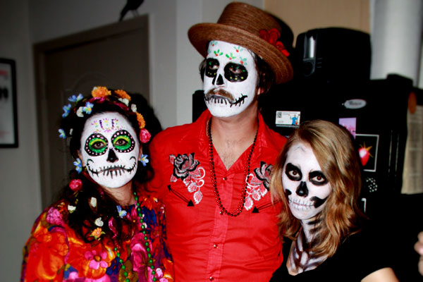 Skeleton and Day of the Dead sugar skull costumes for Halloween party