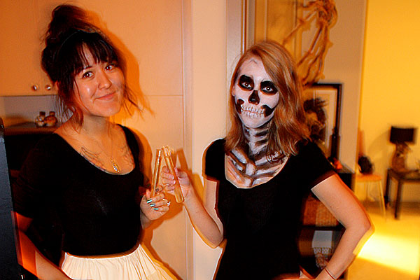 Halloween party skeleton and American Apparel Ballerina. Holding test tube shots