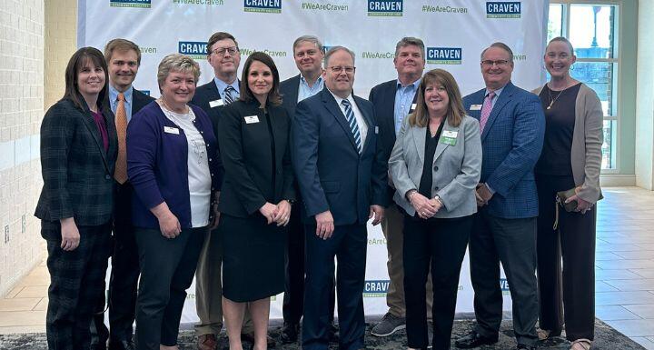 Group photo of attorneys and staff at the 14th Annual Community Fabric Awards