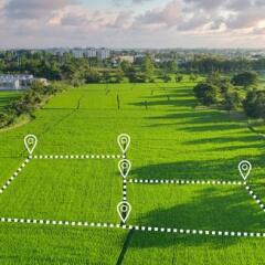 2 Land plots in aerial view for development