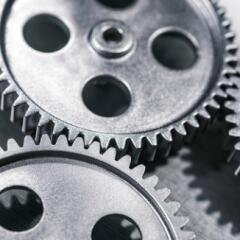 Three silver small metal gears