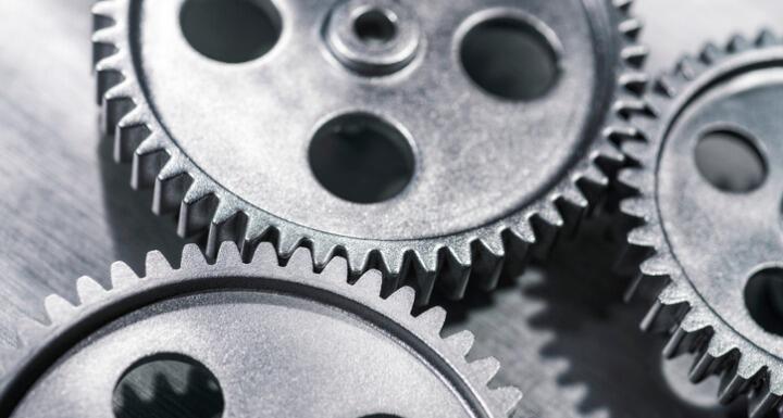 Three silver small metal gears