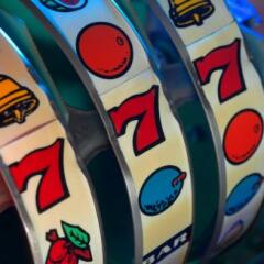 A close-up view of an old slot machine winning numbers