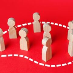 A group of people is circled in dotted line