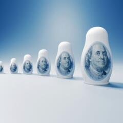 One Hundred American Dollar Bills Printed On Russian Nesting Dolls