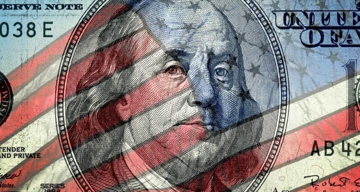 American Flag superimposed on a one hundred dollar bill