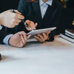 At the meeting, a team of lawyers discussed the lawsuit