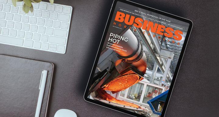 A tablet with the Cover of the BNC November 2024 Issue sitting on desk