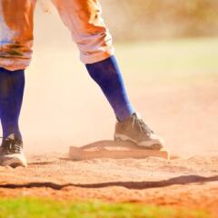 Dirty baseball player on base