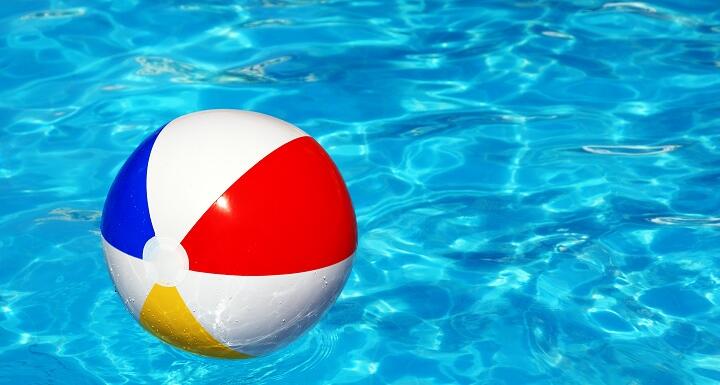 Beach ball in swimming pool