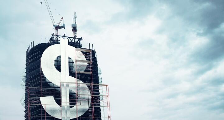 A dollar sign on building under construction