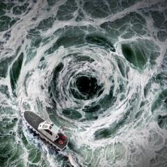 Boat escaping a whirlpool