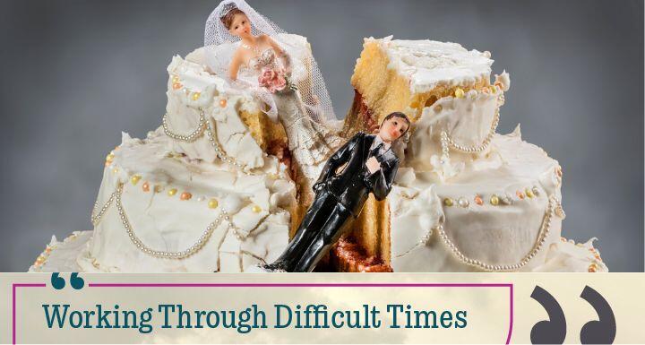 destoryed wedding cake with bride and groom topper