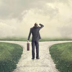 Businessman at crossroad