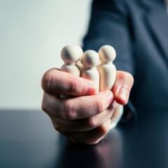 CEO Influence Business Agreements and Employee Dismissals