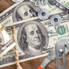 Close up bolts nuts and money