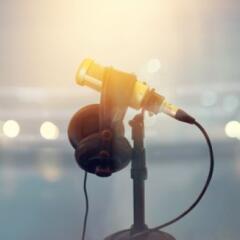 Close up microphone and headphone for announcer