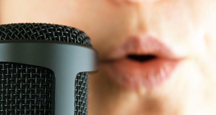 Close up of female singer and microphone
