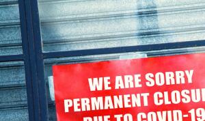 Closed due to COVID-19 sign