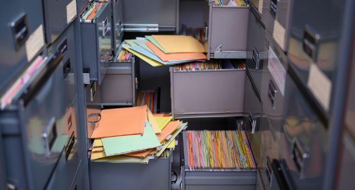 Colorful documents placed in the filing cabinet