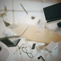 Concept of chaos in the office with flying objects 