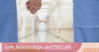 two people in medical scrubs holding hands