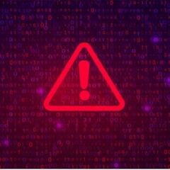 Digital triangle with exclamation point indicating a cyber alert
