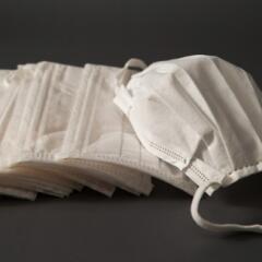 Medical masks on dark background