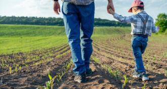 Father showing his son the family business